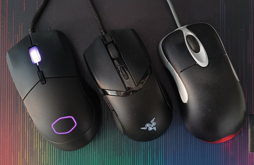Three computer mice on a mouse pad